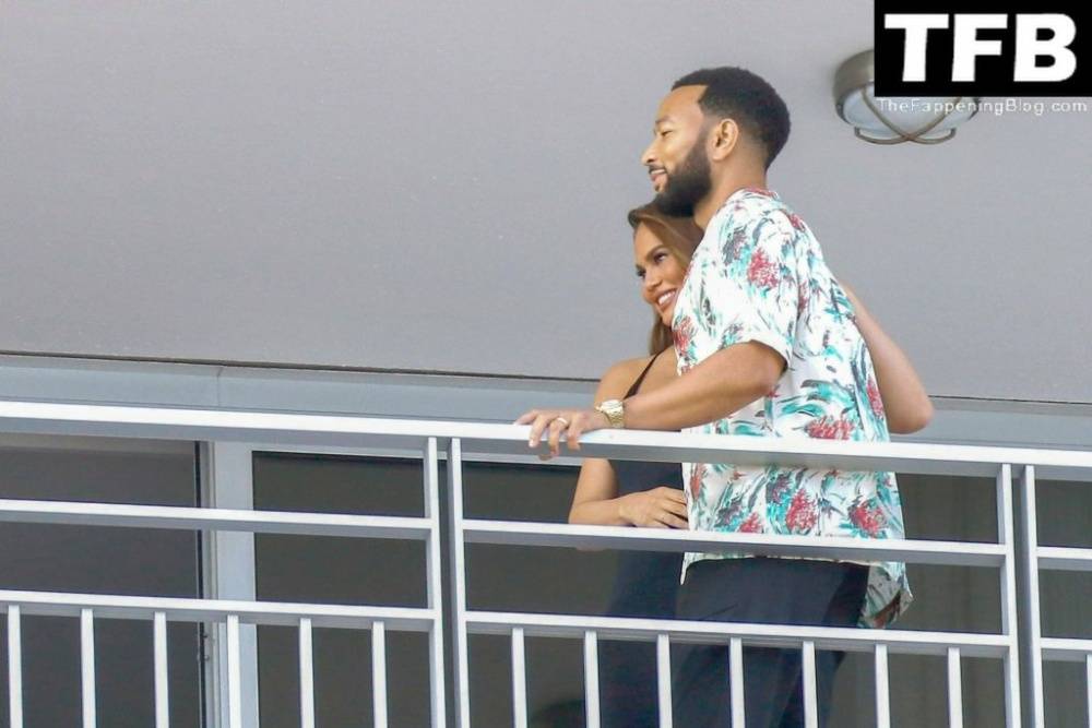 Chrissy Teigen & John Legend Kiss and Pose During an Impromptu Balcony Shoot - #6