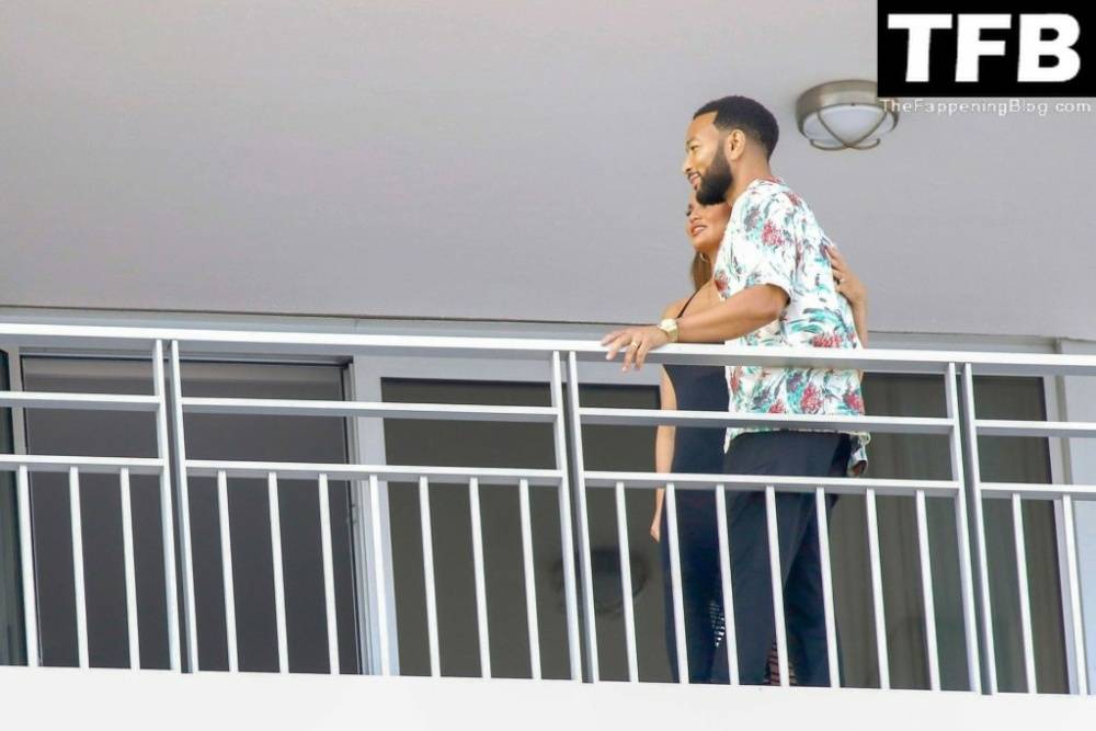 Chrissy Teigen & John Legend Kiss and Pose During an Impromptu Balcony Shoot - #9