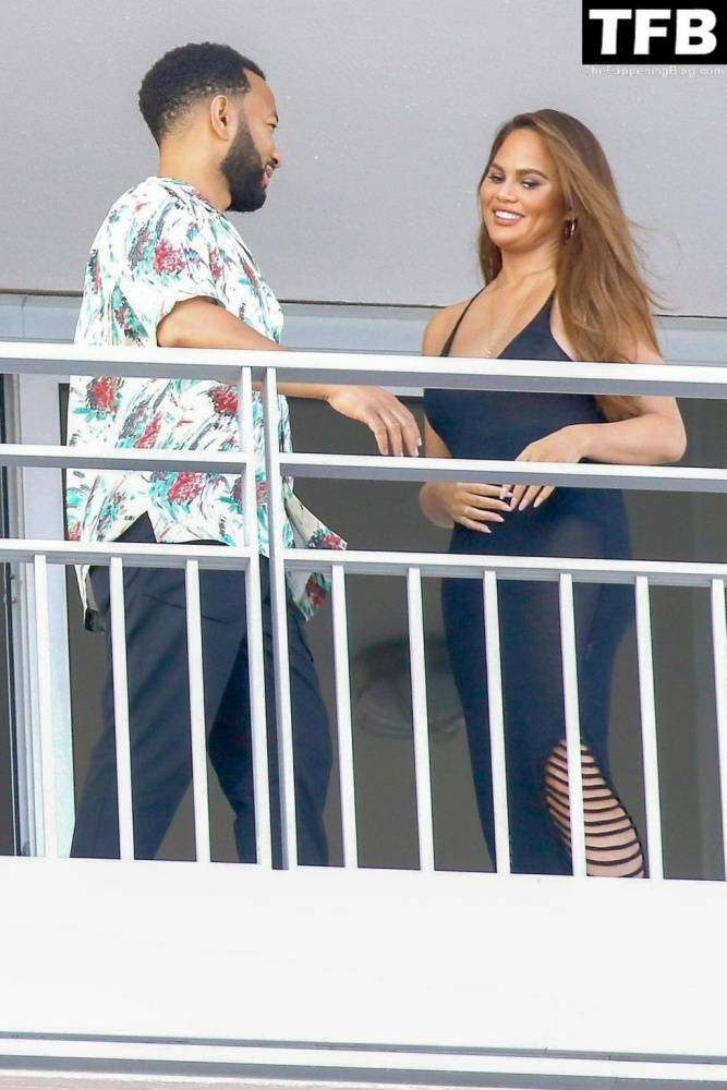 Chrissy Teigen & John Legend Kiss and Pose During an Impromptu Balcony Shoot - #18