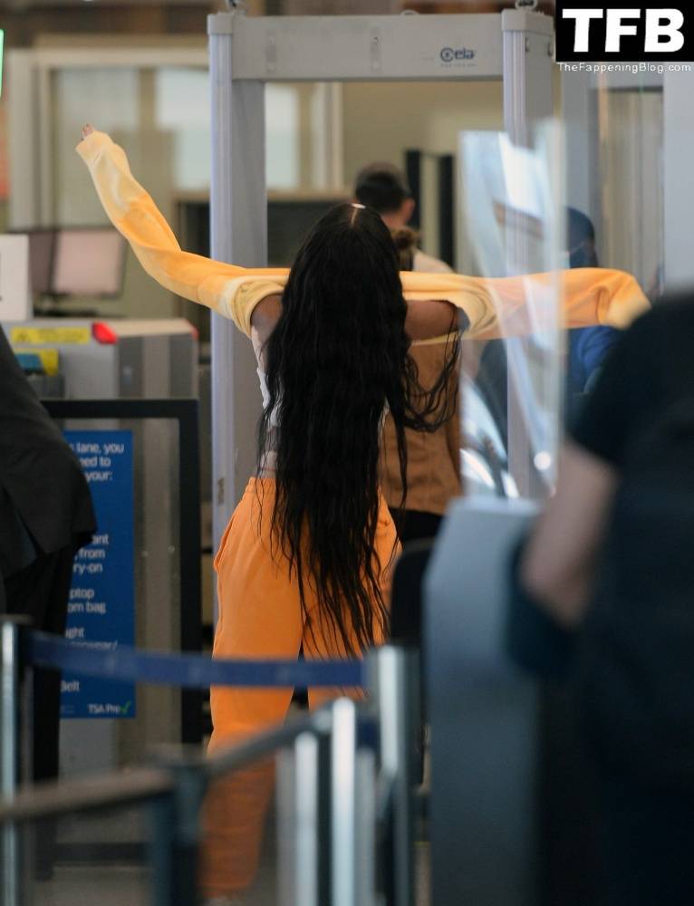 Winnie Harlow Flashes a Wave and a Smile as She Jets Out of LAX Airport - #23