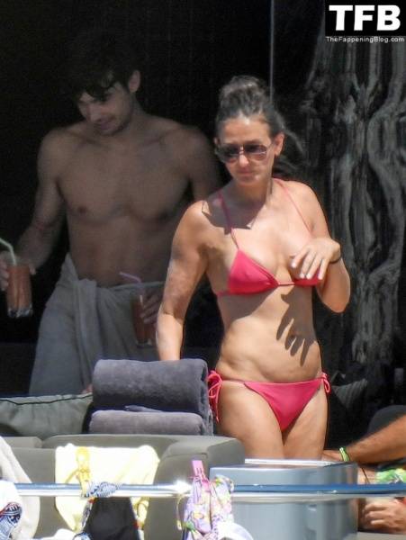 Demi Moore Looks Sensational at 59 in a Red Bikini on Vacation in Greece on modeladdicts.com