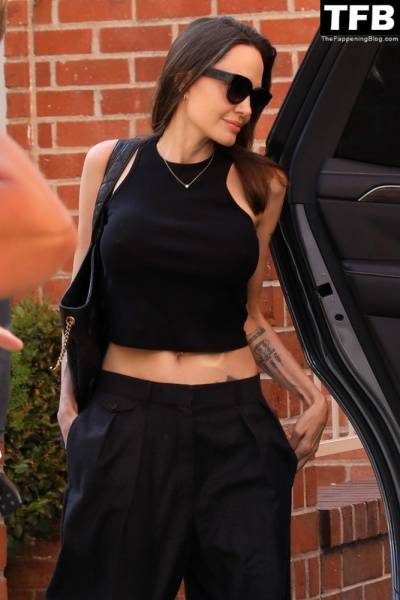 Angelina Jolie Shows Off Her Tight Tummy Leaving an Office Building on modeladdicts.com