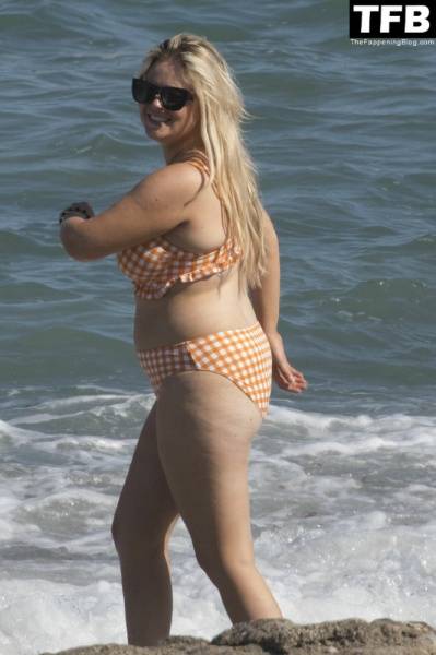 Emily Atack is Seen Having Fun by the Sea and Doing a Shoot on Holiday in Spain - Spain on modeladdicts.com