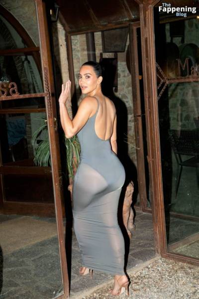 Kim Kardashian Shows Off Her Assets in a Sheer Dress (14 Photos) on modeladdicts.com