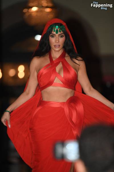 Kim Kardashian Stuns in a Red Dress in Mumbai (33 Photos) - India on modeladdicts.com