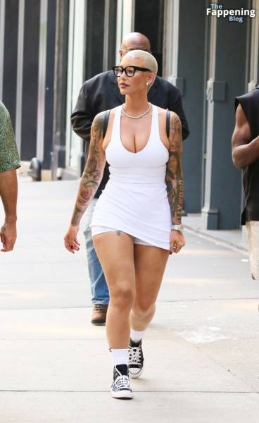 Amber Rose Turns Heads in a Revealing White Mini Dress During SoHo Outing (39 Photos) on modeladdicts.com